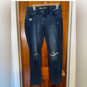 Old Navy Rockstar Mid rise jeans. Size 12. Distressed style.
